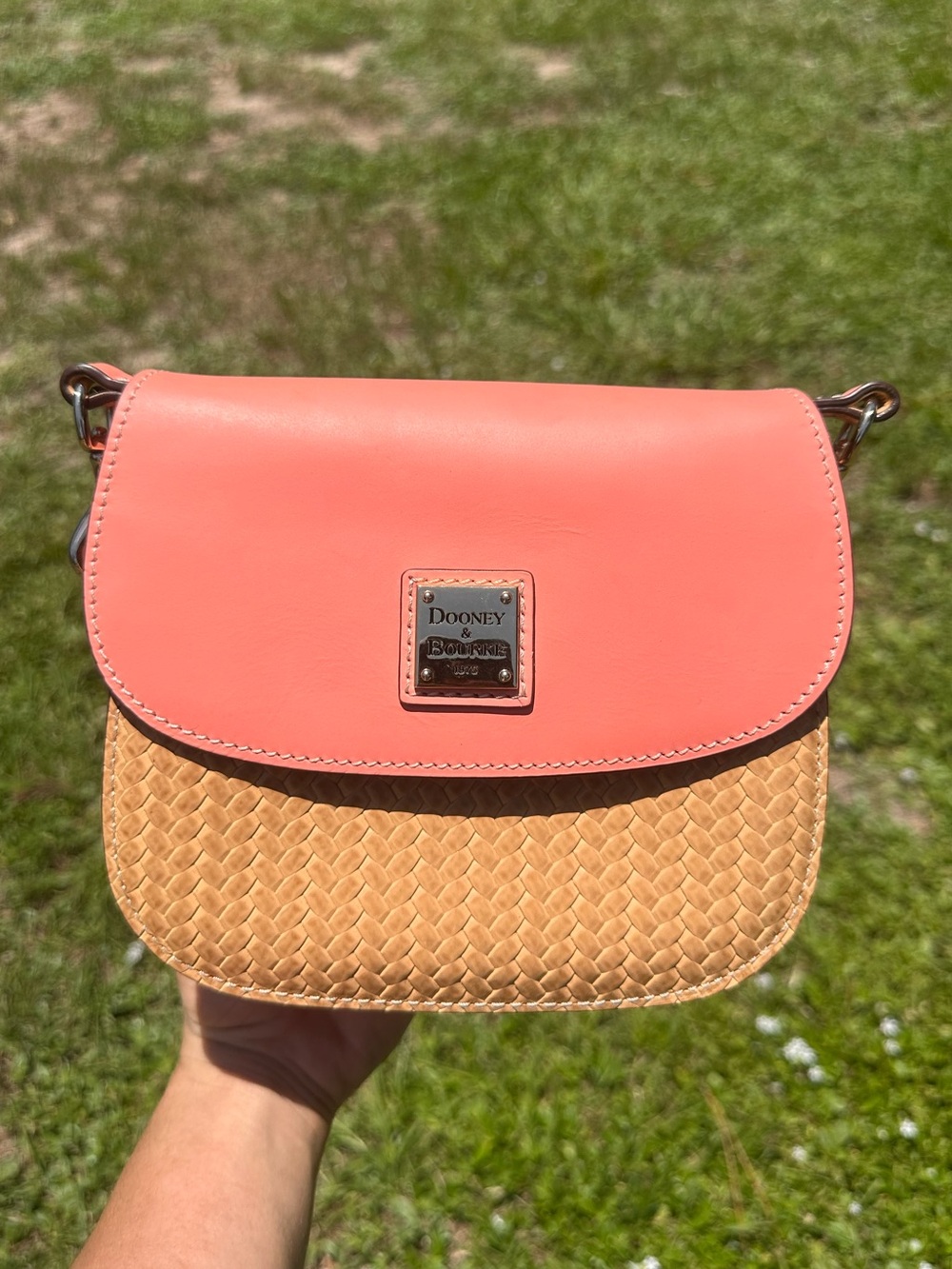 Dooney & Bourke Beacon Saddle Crossbody in Coral